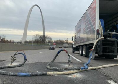 Raising Solutions truck raising highway near St. Louis Arch