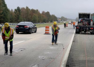 Deep foam injection along highway to raise surface