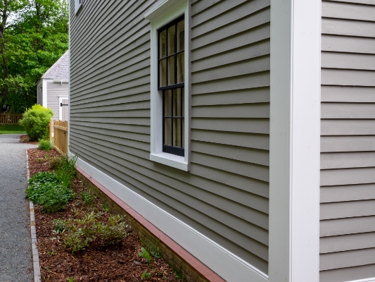 searching for studs behind board